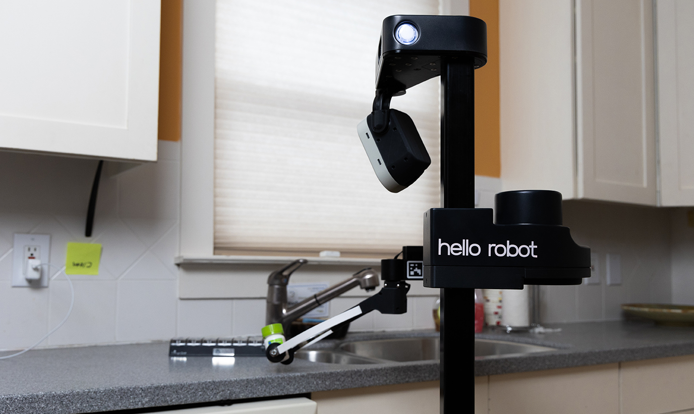 home robot in a kitchen fetching a medicine bottle